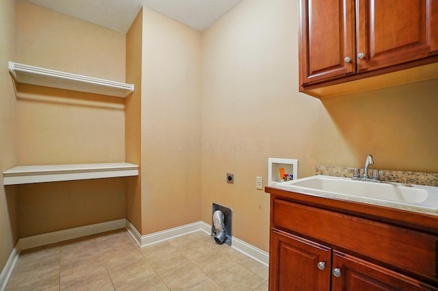 4993 Denbigh Ct, Columbus, OH 43220 - washroom with electric dryer hookup, cabinet space, washer hookup, and light tile patterned floors