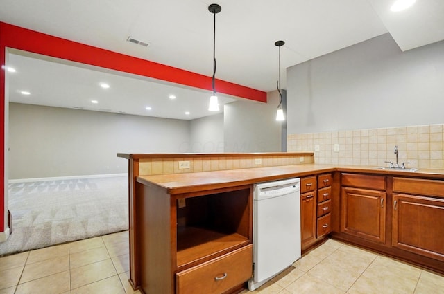 4993 Denbigh Ct, Columbus, OH 43220 - kitchen with white dishwasher, light carpet, a peninsula, light countertops, and recessed lighting