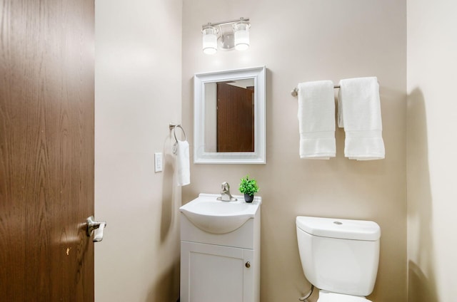 1672 Flat Rock Ct, Columbus, OH 43235 - half bathroom featuring vanity and toilet