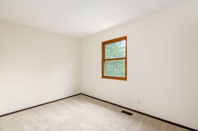 1672 Flat Rock Ct, Columbus, OH 43235 - spare room featuring light carpet and baseboards
