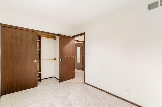 1672 Flat Rock Ct, Columbus, OH 43235 - unfurnished bedroom with carpet, a closet, and baseboards