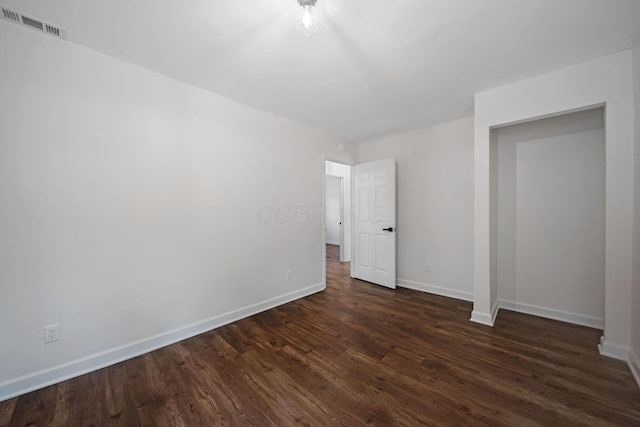 13404 Maple Rd NE, Thornville, OH 43076 - unfurnished room featuring dark wood-style floors and baseboards