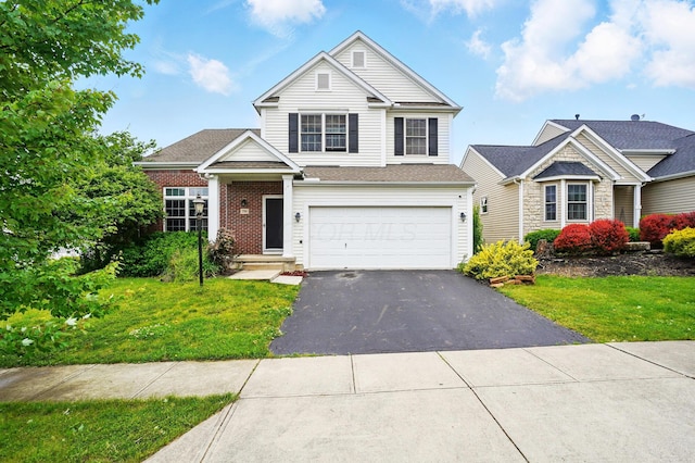 790 Salinger Dr, Lithopolis, OH 43136 - traditional home with asphalt driveway, an attached garage, and a front yard