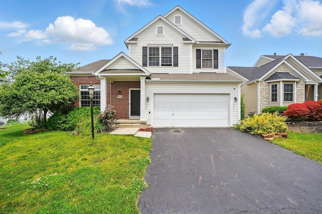 790 Salinger Dr, Lithopolis, OH 43136 - view of front of property featuring asphalt driveway, a front lawn, and a garage