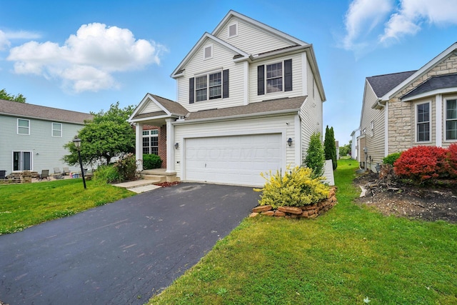 790 Salinger Dr, Lithopolis, OH 43136 - traditional home with driveway, an attached garage, and a front lawn