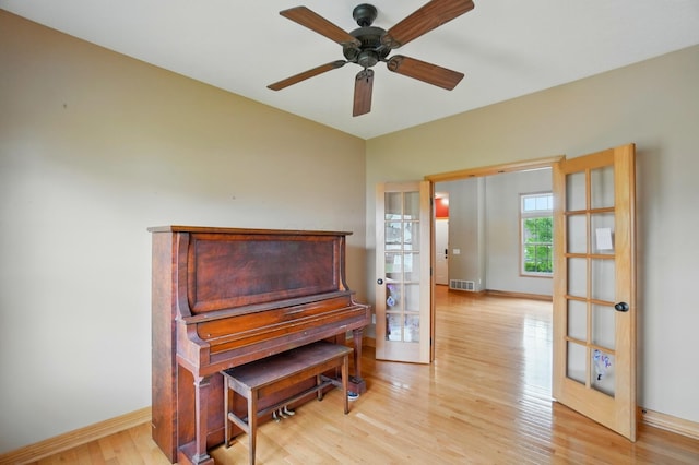 790 Salinger Dr, Lithopolis, OH 43136 - living area featuring light wood-style flooring, a ceiling fan, baseboards, and french doors