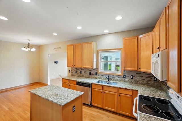 790 Salinger Dr, Lithopolis, OH 43136 - kitchen with white appliances, a sink, a chandelier, a center island, and tasteful backsplash