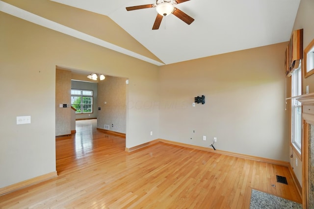 790 Salinger Dr, Lithopolis, OH 43136 - spare room with vaulted ceiling, ceiling fan, light wood-style floors, baseboards, and a chandelier