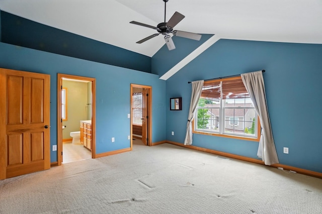 790 Salinger Dr, Lithopolis, OH 43136 - unfurnished bedroom with carpet floors, baseboards, connected bathroom, high vaulted ceiling, and ceiling fan