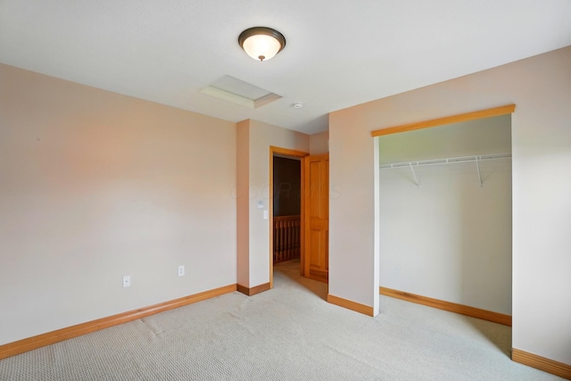 790 Salinger Dr, Lithopolis, OH 43136 - unfurnished bedroom with baseboards, light carpet, a closet, and attic access