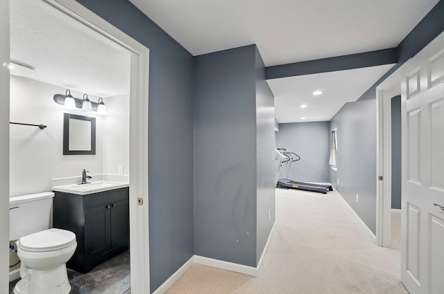 790 Salinger Dr, Lithopolis, OH 43136 - corridor featuring baseboards, carpet, a sink, and recessed lighting