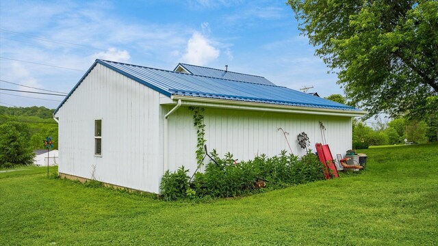 12151 State Route 93 N, Logan, OH 43138 - view of side of property featuring a lawn and metal roof