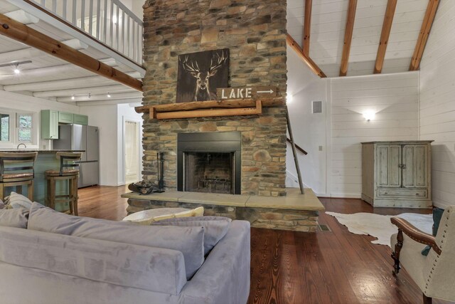 510 Natchez Ln, Sugar Grove, OH 43155 - living area featuring beamed ceiling, hardwood / wood-style floors, a fireplace, and high vaulted ceiling