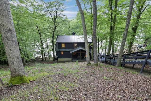 510 Natchez Ln, Sugar Grove, OH 43155 - rear view of house with a chimney and metal roof