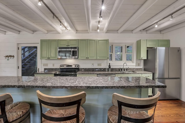 510 Natchez Ln, Sugar Grove, OH 43155 - kitchen with rail lighting, green cabinetry, and beam ceiling