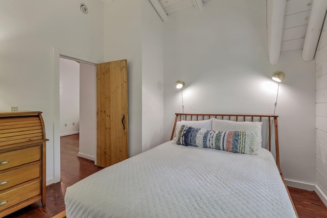 510 Natchez Ln, Sugar Grove, OH 43155 - bedroom with beamed ceiling, a towering ceiling, dark wood-style floors, and baseboards