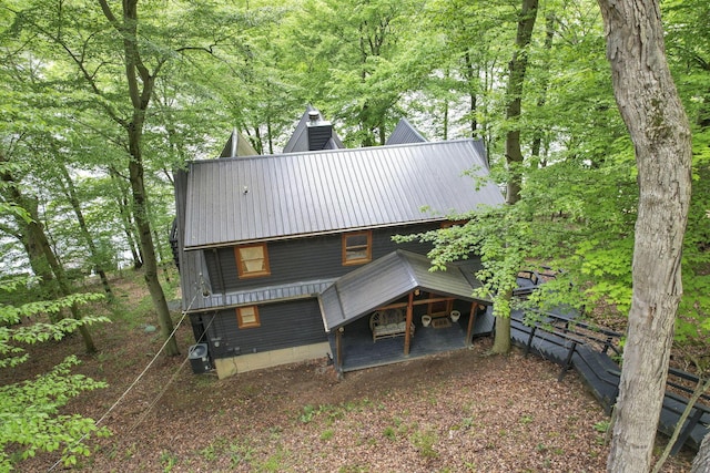 510 Natchez Ln, Sugar Grove, OH 43155 - back of property featuring metal roof and central AC unit
