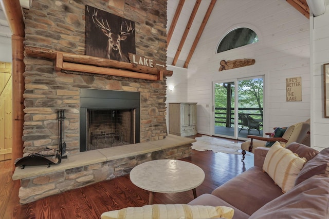510 Natchez Ln, Sugar Grove, OH 43155 - living area featuring high vaulted ceiling, wood finished floors, beamed ceiling, a stone fireplace, and wooden walls