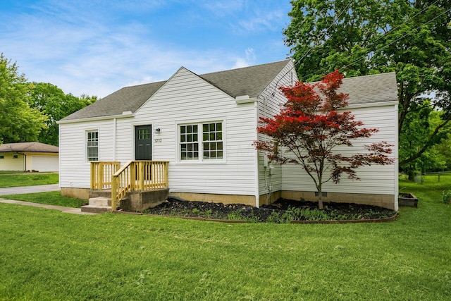 3232 Williams Rd, Columbus, OH 43207 - view of front facade with a front lawn and a shingled roof