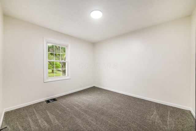 3232 Williams Rd, Columbus, OH 43207 - empty room with carpet flooring and baseboards