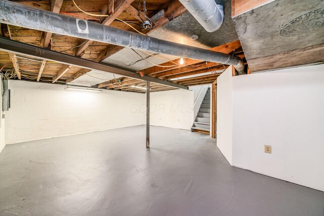 3232 Williams Rd, Columbus, OH 43207 - unfinished basement featuring stairway
