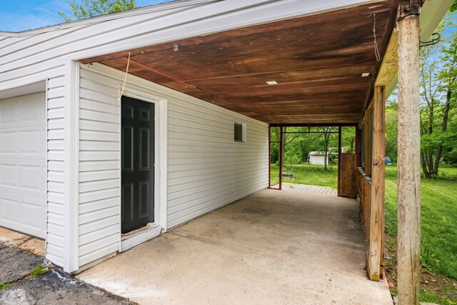 3232 Williams Rd, Columbus, OH 43207 - view of patio with a garage and an outbuilding