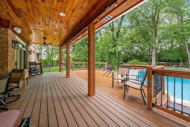 7607 Stone Ridge Dr, Springboro, OH 45066 - wooden deck with view of scattered trees and a ceiling fan