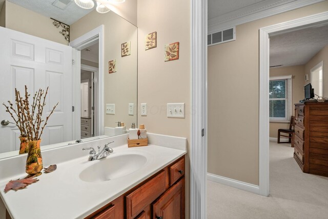 7607 Stone Ridge Dr, Springboro, OH 45066 - bathroom featuring vanity and baseboards