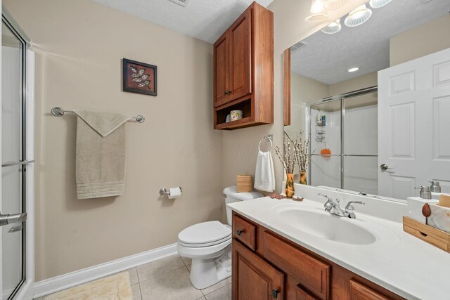 7607 Stone Ridge Dr, Springboro, OH 45066 - full bath with baseboards, a stall shower, toilet, vanity, and a textured ceiling