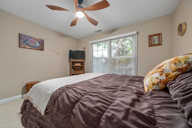 7607 Stone Ridge Dr, Springboro, OH 45066 - bedroom with carpet floors, ceiling fan, and baseboards