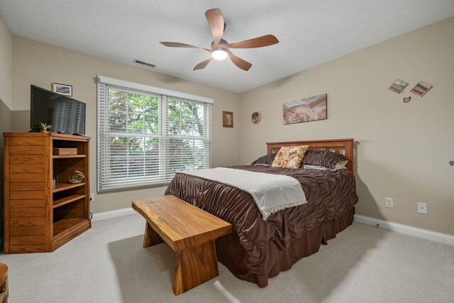 7607 Stone Ridge Dr, Springboro, OH 45066 - bedroom featuring light colored carpet, baseboards, and a ceiling fan