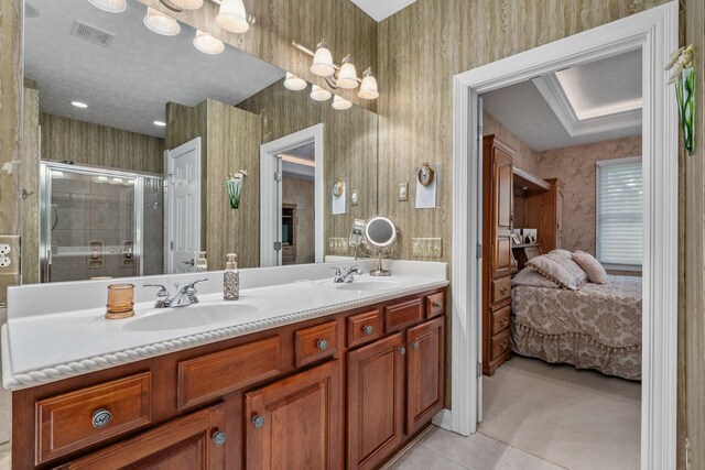 7607 Stone Ridge Dr, Springboro, OH 45066 - bathroom with ensuite bath, double vanity, tile patterned flooring, wallpapered walls, and a shower stall