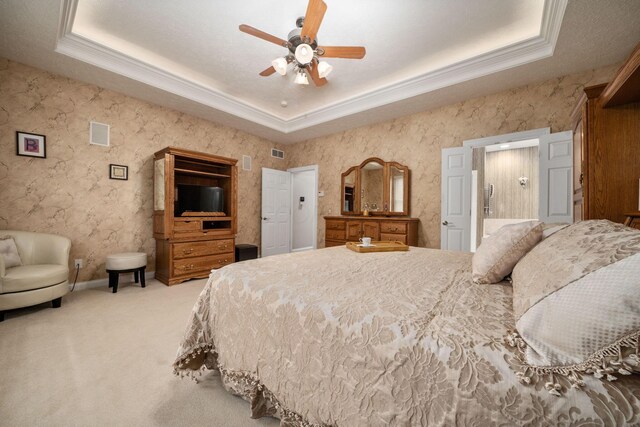 7607 Stone Ridge Dr, Springboro, OH 45066 - bedroom featuring a raised ceiling, ornamental molding, light colored carpet, baseboards, and a ceiling fan
