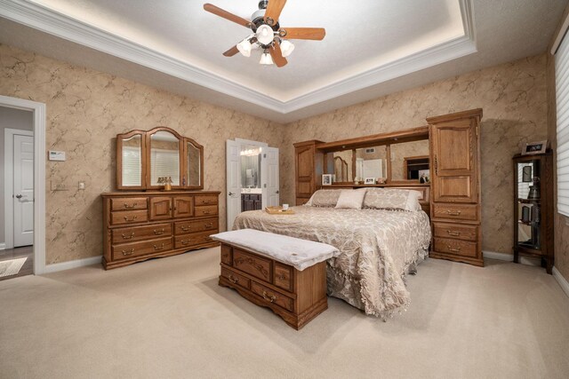 7607 Stone Ridge Dr, Springboro, OH 45066 - bedroom with light carpet, ornamental molding, a raised ceiling, ensuite bath, and baseboards