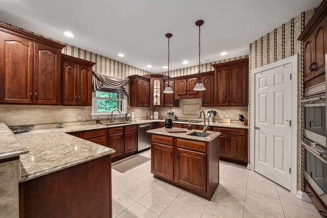 7607 Stone Ridge Dr, Springboro, OH 45066 - kitchen featuring a sink, appliances with stainless steel finishes, wallpapered walls, hanging light fixtures, and recessed lighting
