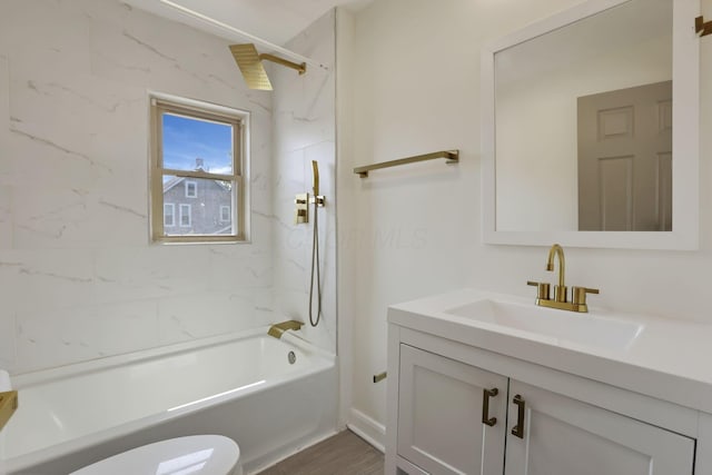 399 E Woodrow Ave, Columbus, OH 43207 - full bathroom with vanity, bathtub / shower combination, and wood finished floors