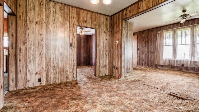 8045 Old Town Rd, Roseville, OH 43777 - carpeted spare room featuring a ceiling fan and wooden walls