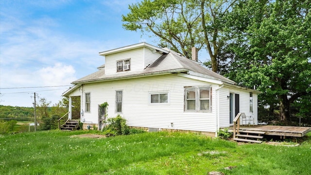 8045 Old Town Rd, Roseville, OH 43777 - rear view of property with a deck and a yard