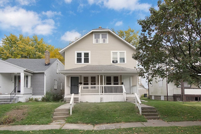 162 Columbian Ave Unit 164, Columbus, OH 43223 - american foursquare style home featuring covered porch and a front lawn