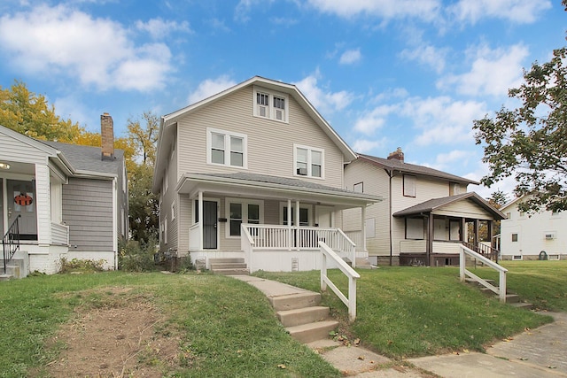 162 Columbian Ave Unit 164, Columbus, OH 43223 - american foursquare style home with covered porch and a front lawn