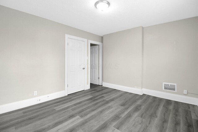162 Columbian Ave Unit 164, Columbus, OH 43223 - empty room with wood finished floors and baseboards