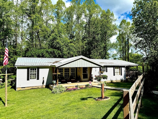 37855 Maysville Greendale Rd, Logan, OH 43138 - view of front of home with a front yard, metal roof, and crawl space