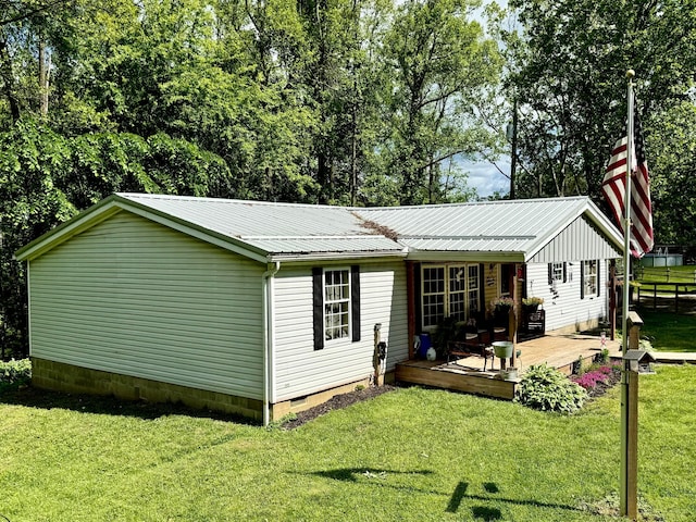 37855 Maysville Greendale Rd, Logan, OH 43138 - view of home's exterior with crawl space, metal roof, and a deck