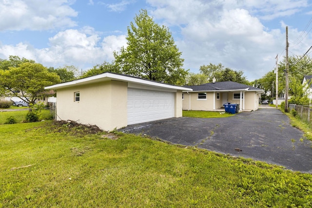 1068 E Markison Ave, Columbus, OH 43207 - view of front of property with stucco siding and a garage