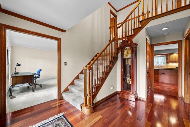 9440 Culross Ct, Dublin, OH 43017 - stairway featuring hardwood / wood-style floors, baseboards, and ornamental molding