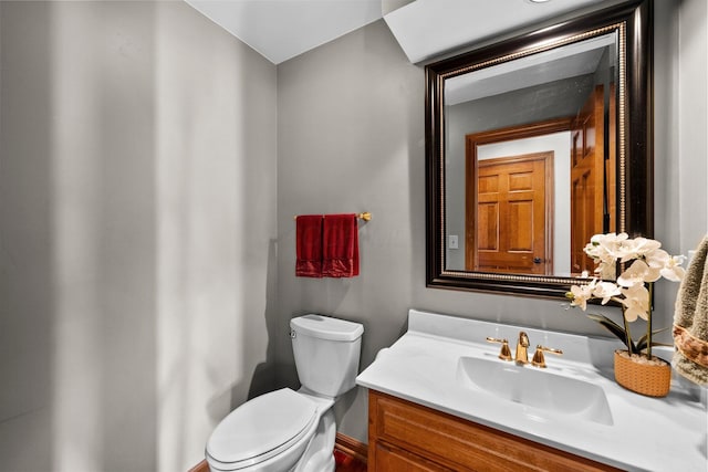 9440 Culross Ct, Dublin, OH 43017 - half bath featuring vanity, toilet, and baseboards