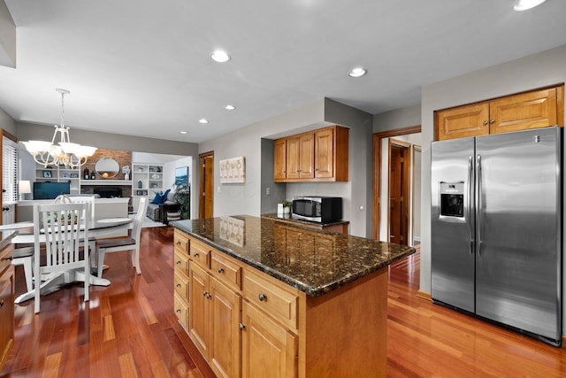 9440 Culross Ct, Dublin, OH 43017 - kitchen featuring stainless steel appliances, a kitchen island, dark wood-style flooring, a chandelier, and recessed lighting