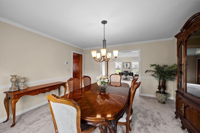 9440 Culross Ct, Dublin, OH 43017 - dining area with light colored carpet, a chandelier, crown molding, and baseboards