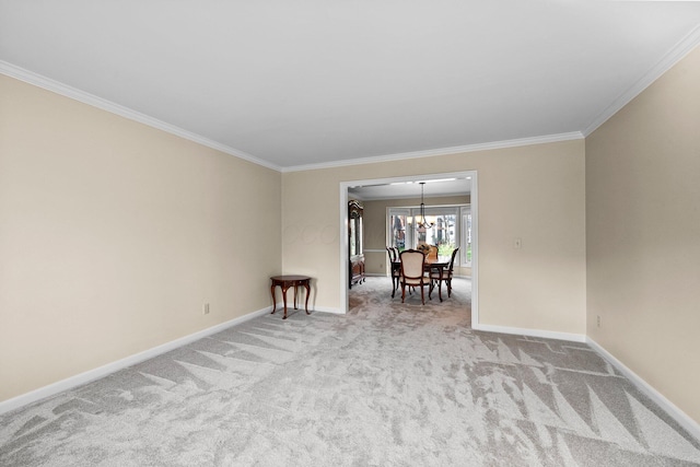 9440 Culross Ct, Dublin, OH 43017 - spare room featuring carpet floors, ornamental molding, a chandelier, and baseboards
