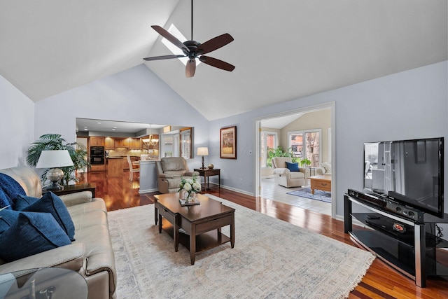 9440 Culross Ct, Dublin, OH 43017 - living area featuring high vaulted ceiling, a ceiling fan, and light wood finished floors